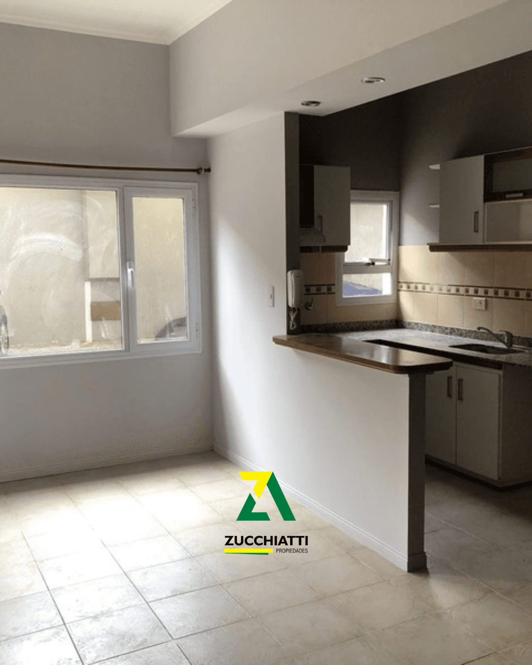 Venta depto planta baja dos dormitorios + 4 cocheras - 3